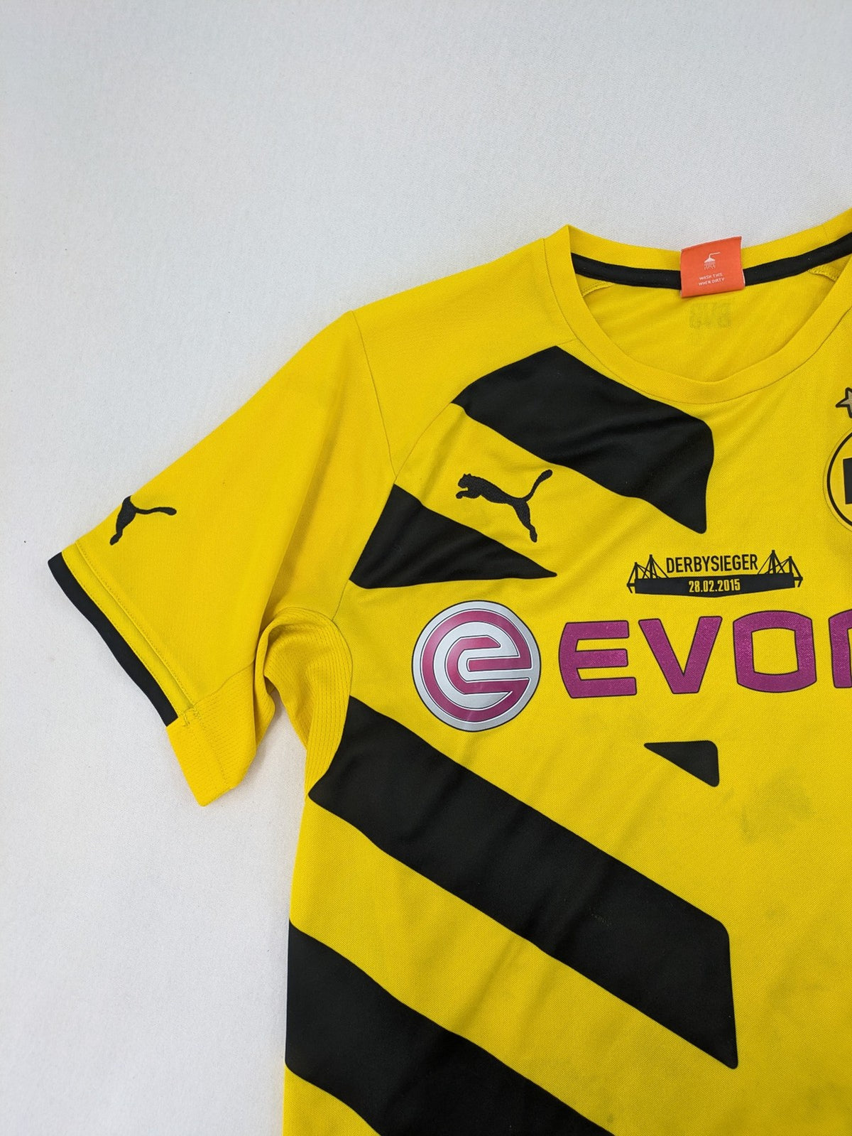 Puma black and purple soccer uniform with yellow accents, Reus #11, "Derbysieger 2015" print.