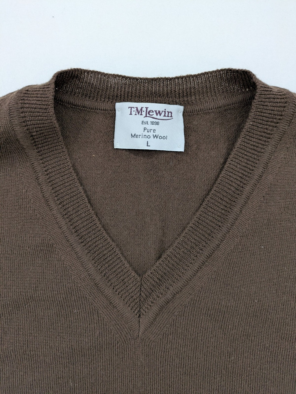 T.M. Lewin brown turtle neck jumper, classic V-neck design, made from 100% merino wool.