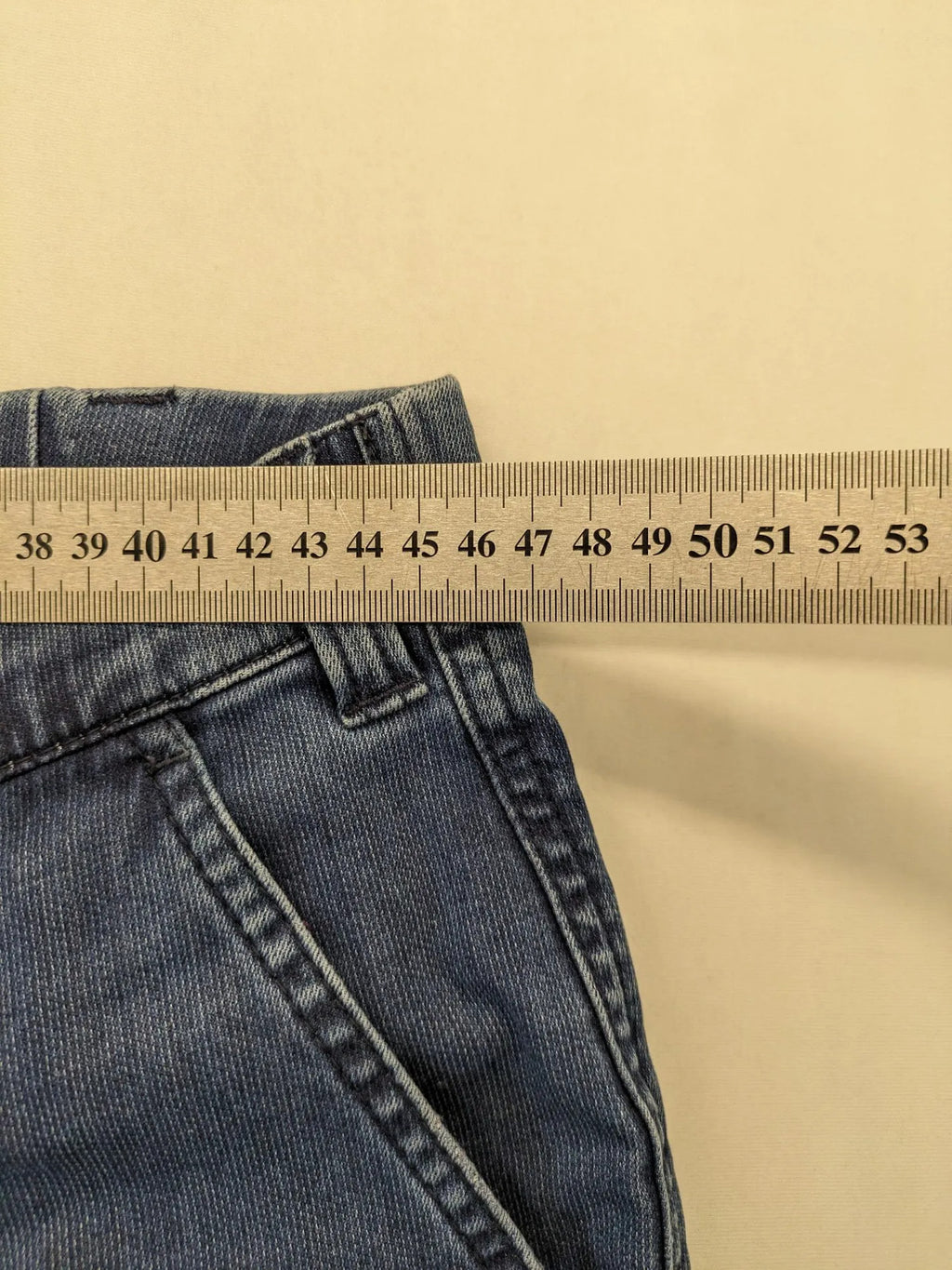 Avena blue chino pants, straight leg, cotton blend, featuring zipper and buttoned pockets.