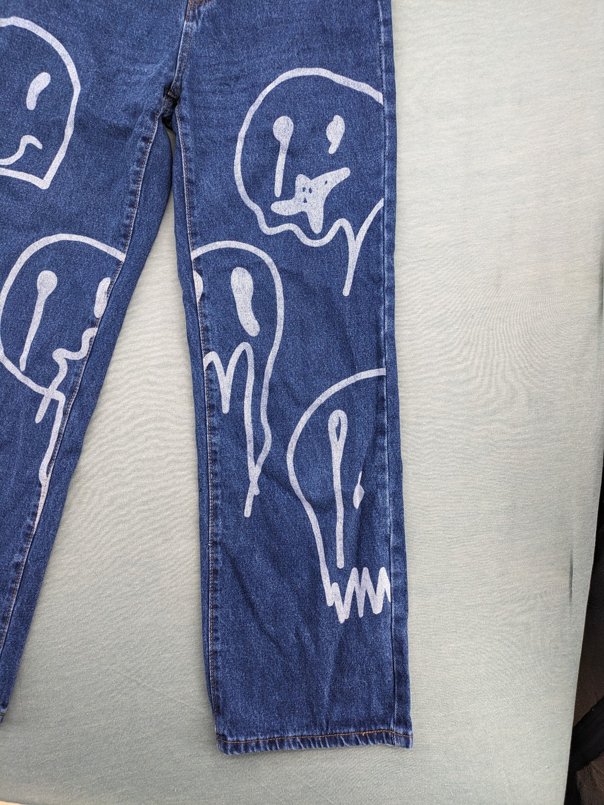 SHEIN blue wide-leg jeans high waist with white smiley face graphics and classic 5-pocket design.