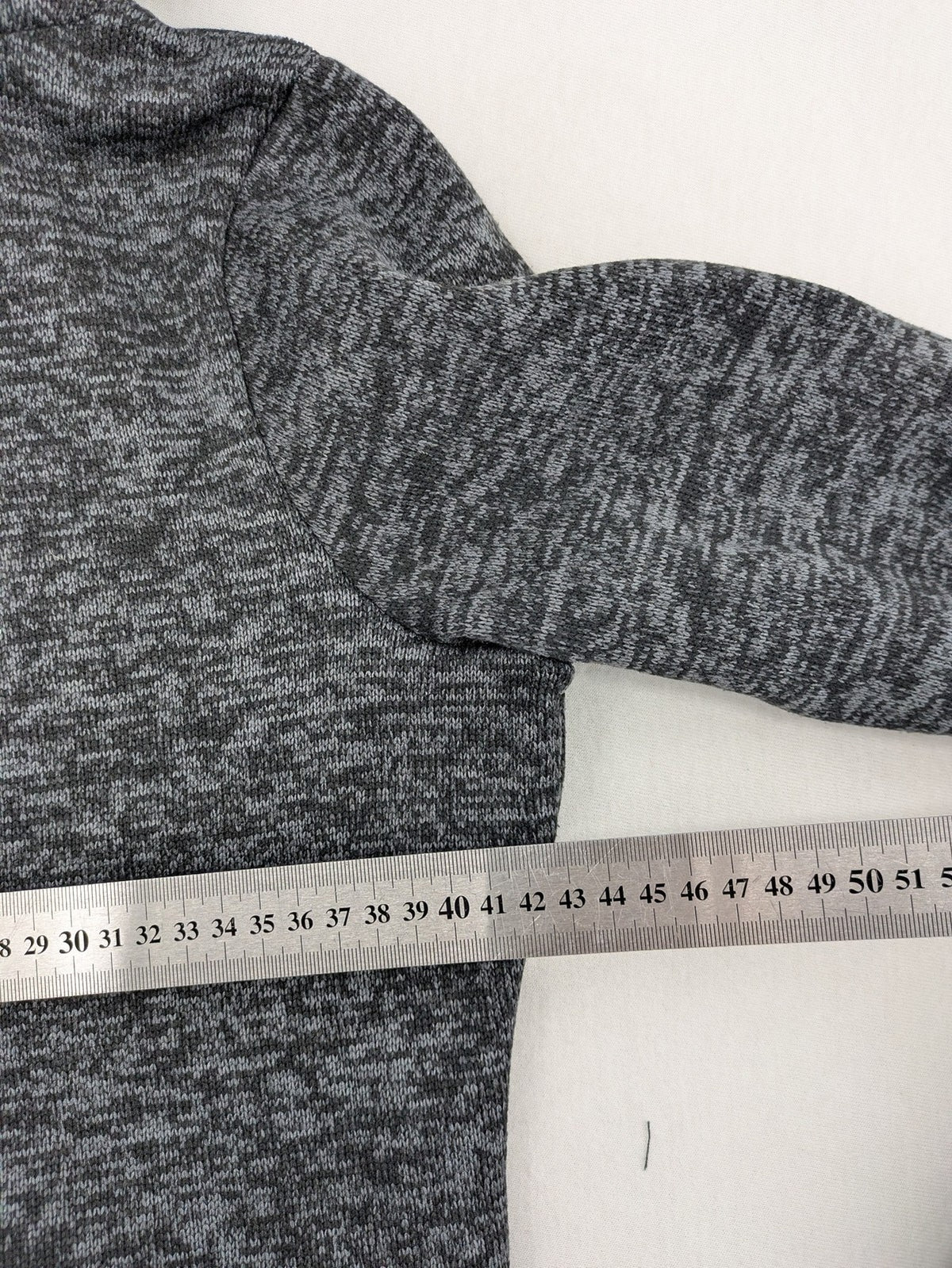 BLIND DATE grey asymmetrical zip hoodie with high fleece-lined waterfall collar.