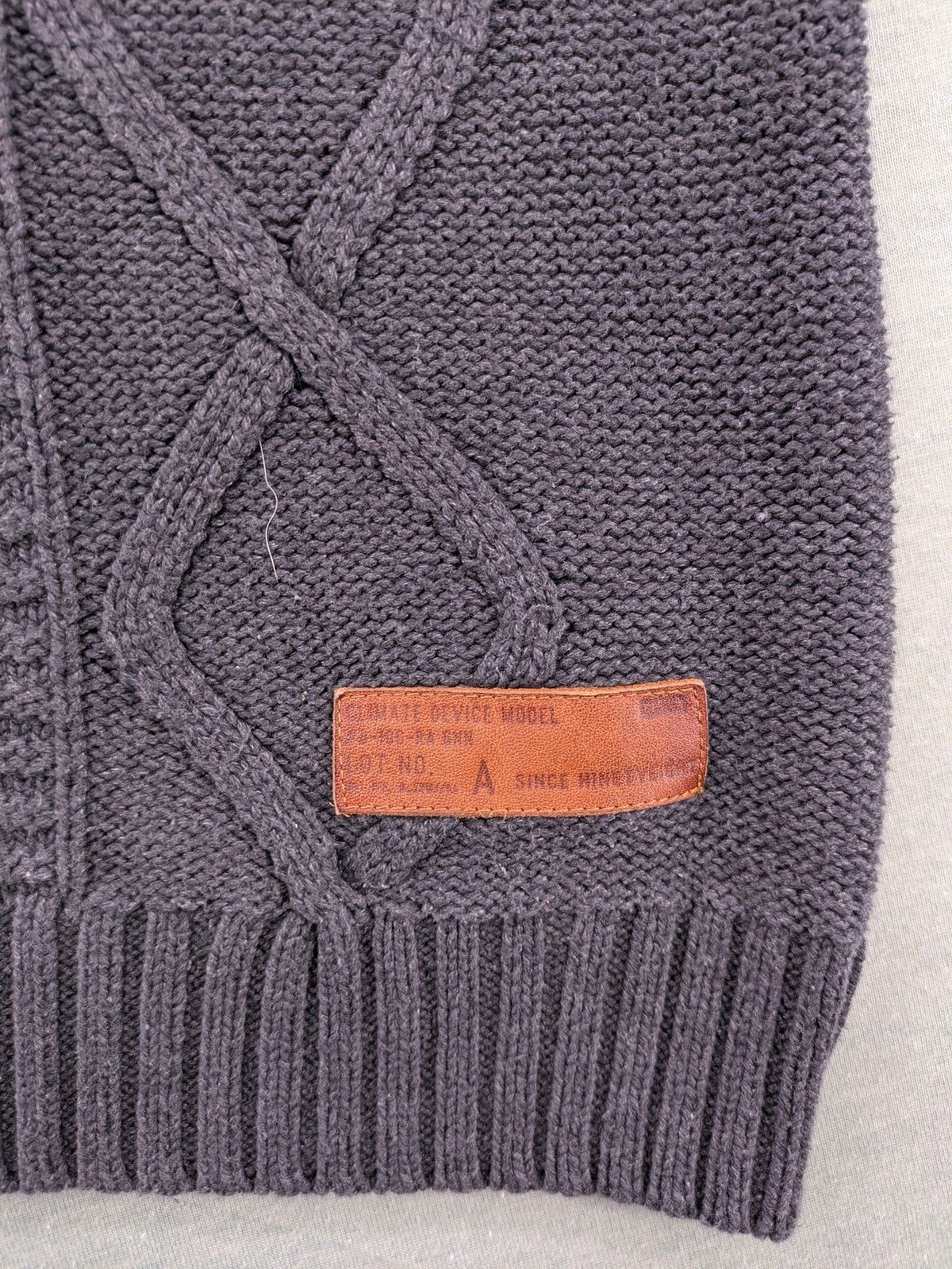 IZAC grey turtle neck jumper with cable knit pattern and used look finish.