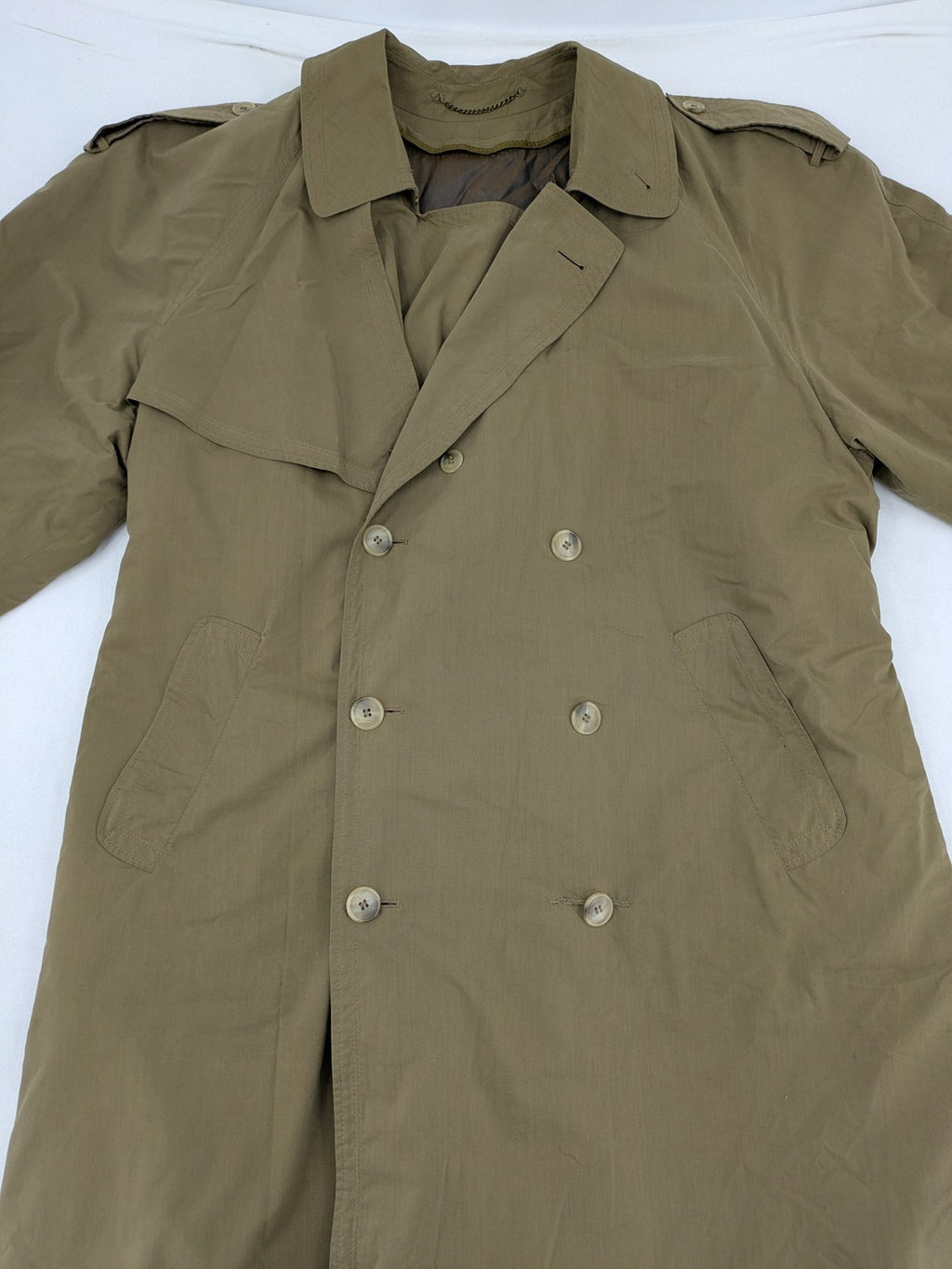 Studio Novum khaki trench coat double-breasted design with belt and wool lining.