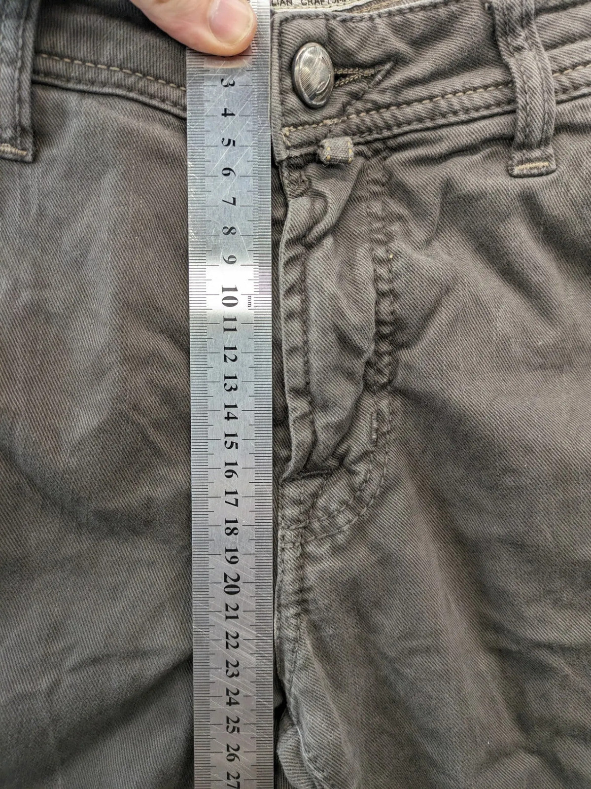 Jacob Cohen black straight jeans with leather logo patch and zip fly, size 32.