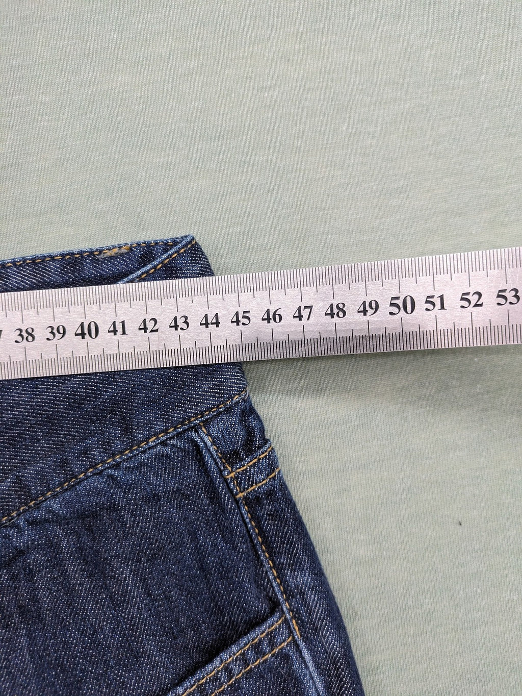 Kickers blue straight leg jeans with double button closure and 5-pocket design.