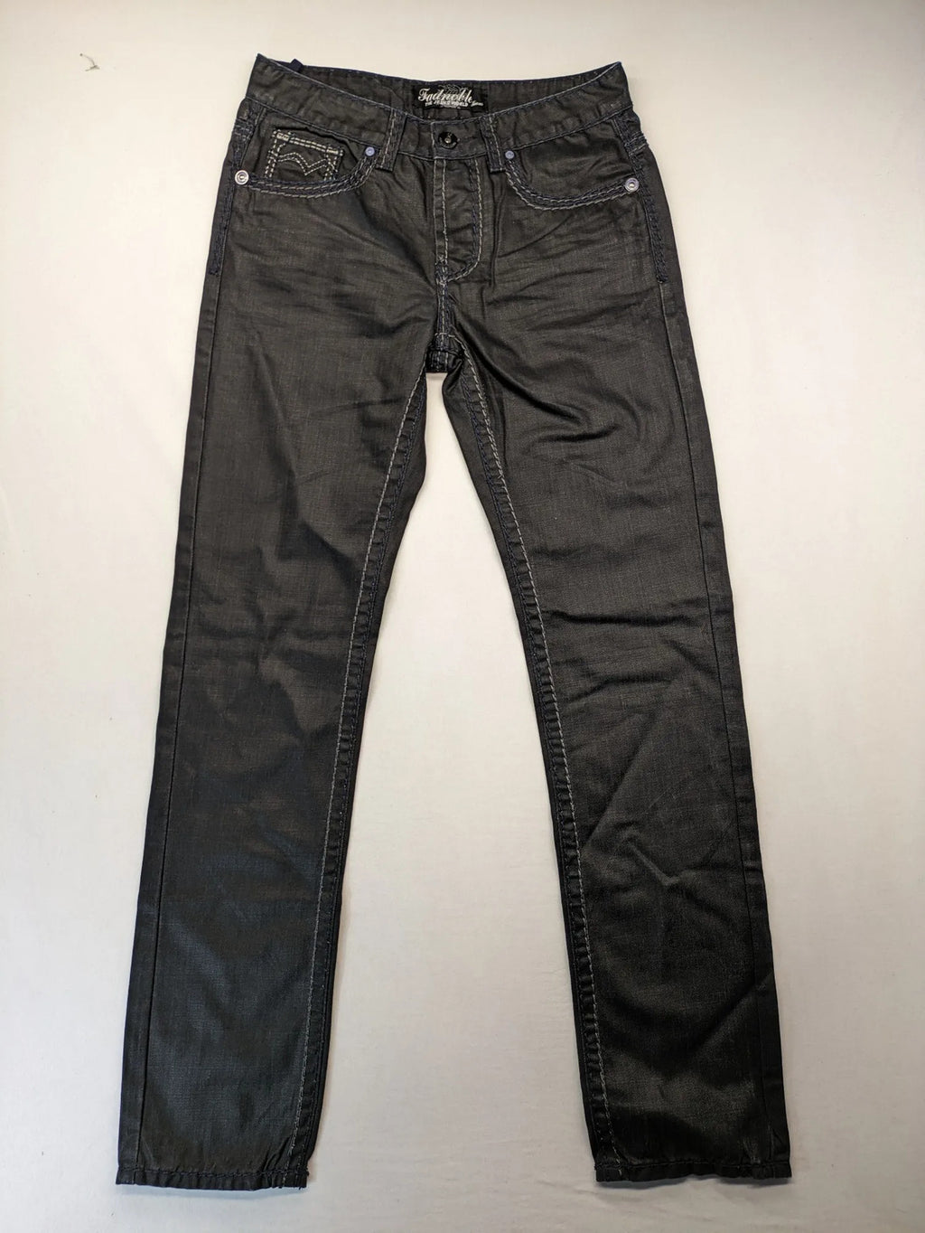 Fadnoble grey straight jeans with button fly and contrasting stitching details.
