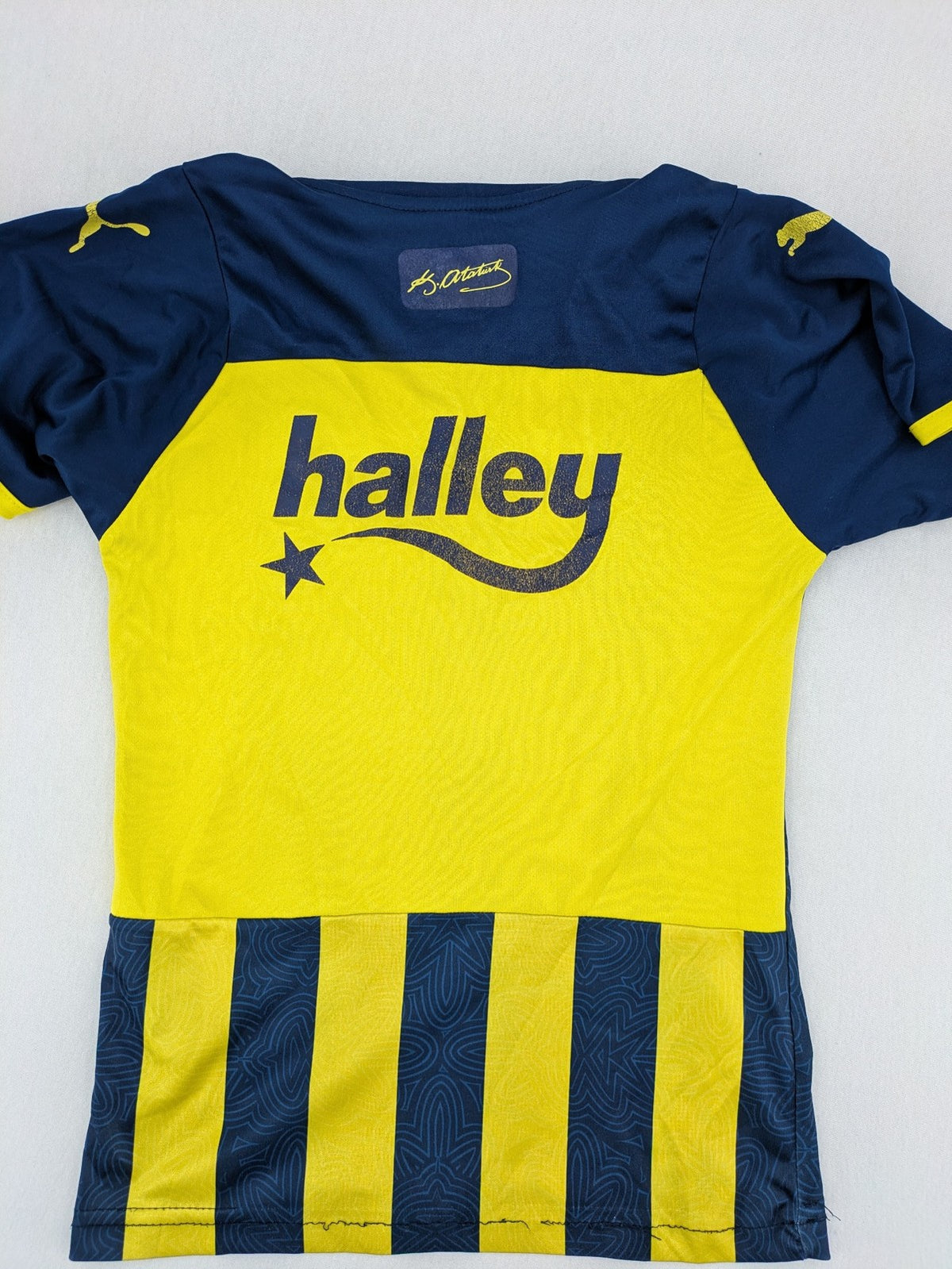 Puma Fenerbahçe kids jersey navy yellow with striped pattern and embroidered club logo.