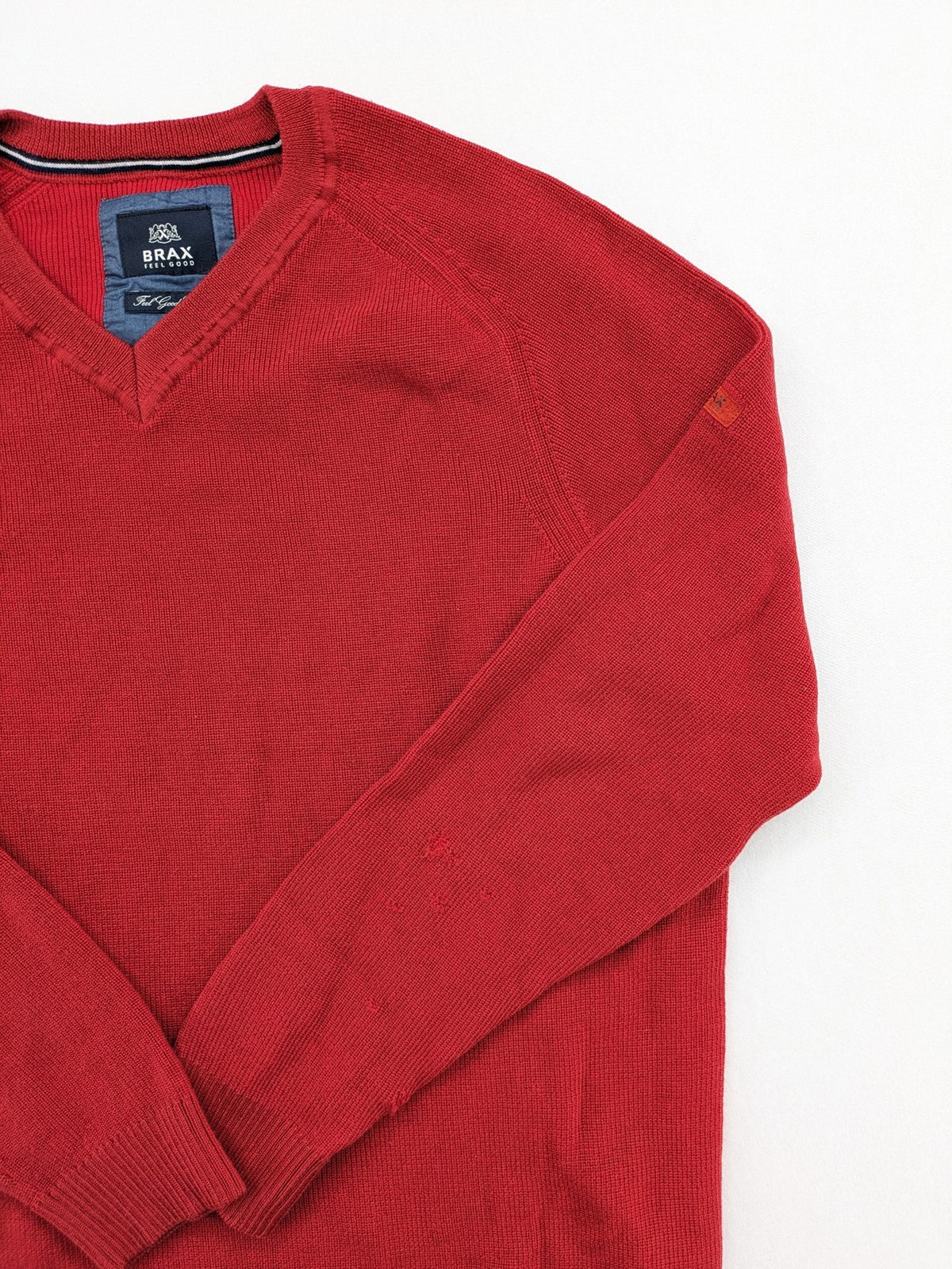 BRAX red turtle neck jumper V-neck design made from merino wool and cotton blend.