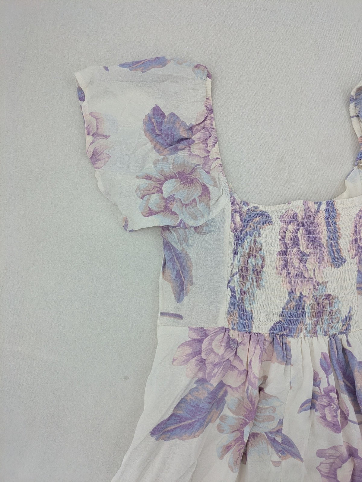 Forever 21 women's midi dress white with blue and purple floral pattern, smocked bodice, puff sleeves.