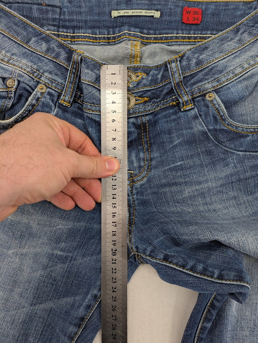 QS by s.Oliver green straight jeans five-pocket design with unique double button closure