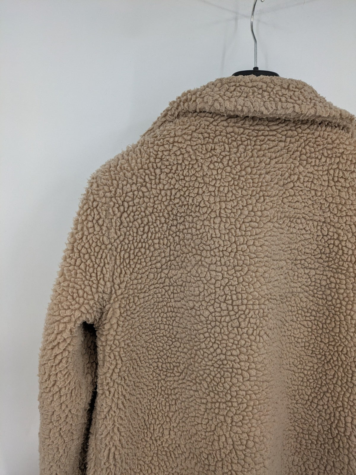 Clockhouse beige teddy coat longline design soft faux fur material with notched collar.
