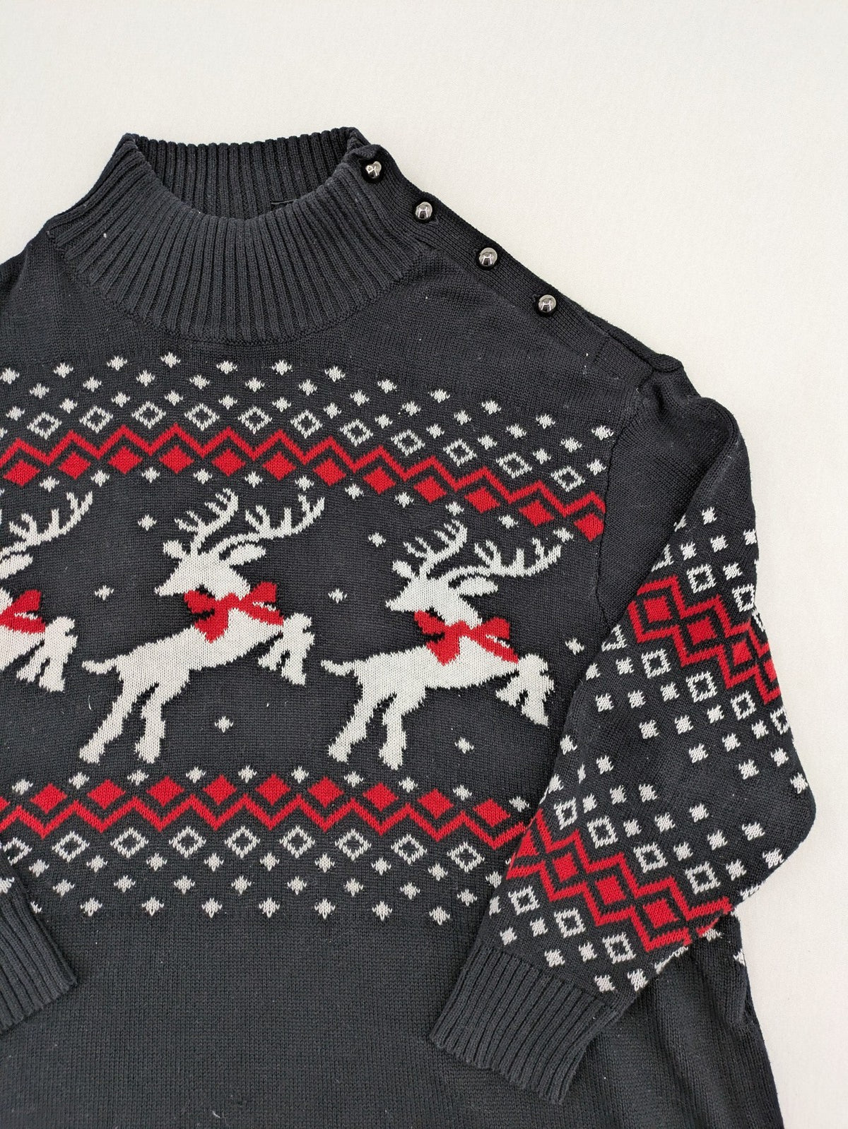 BPC Bonprix grey red white turtle neck jumper with reindeer Fair-Isle pattern and decorative buttons.