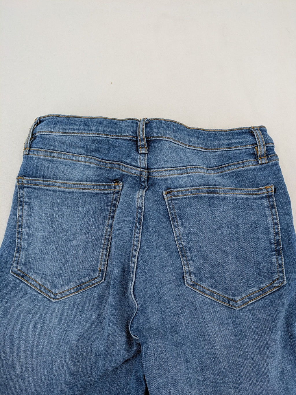MNG blue straight jeans with kick-flare leg and raw hem, made of cotton blend.