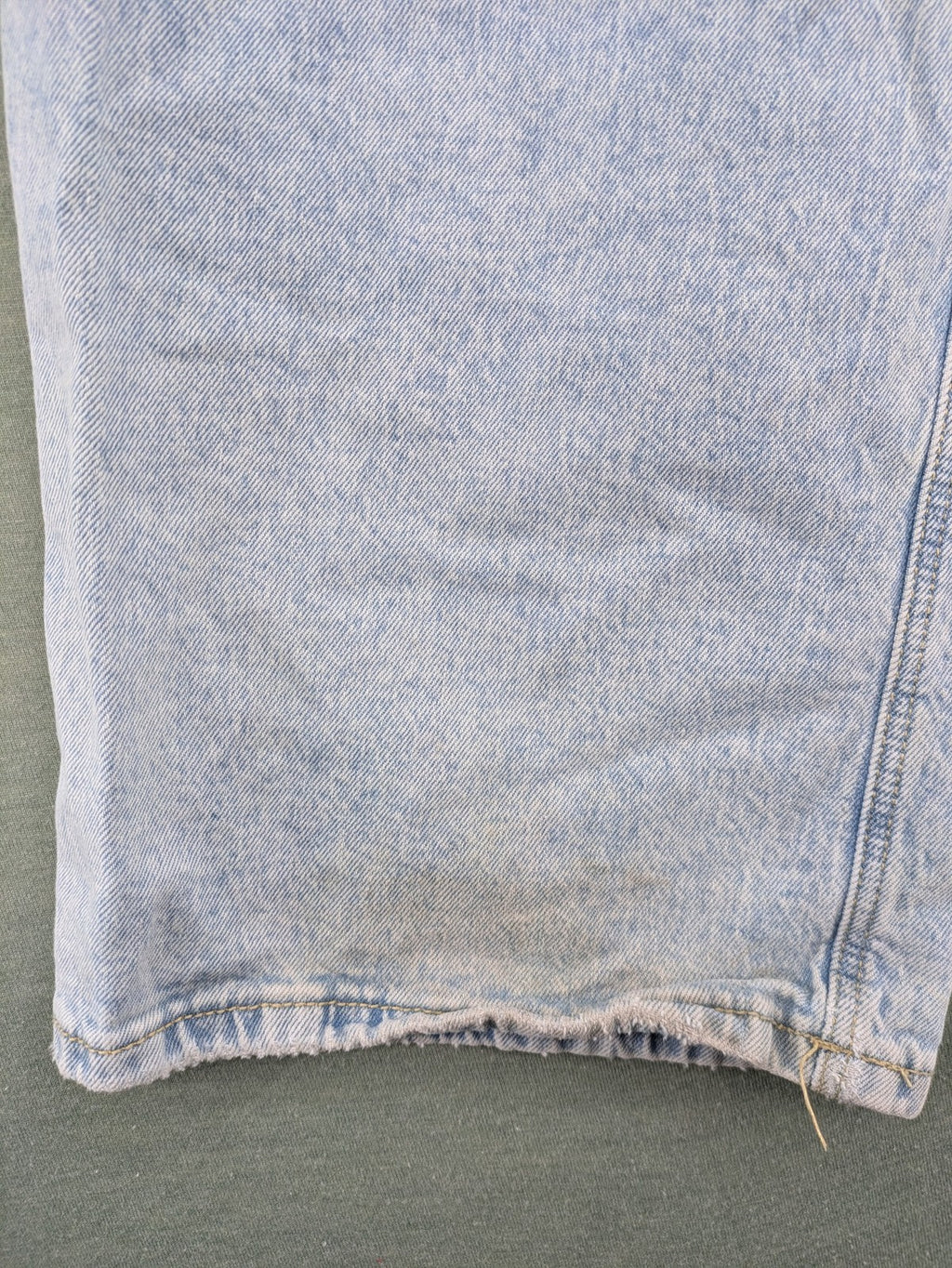 C&A blue wide leg jeans with distressed knee details and classic five-pocket design.