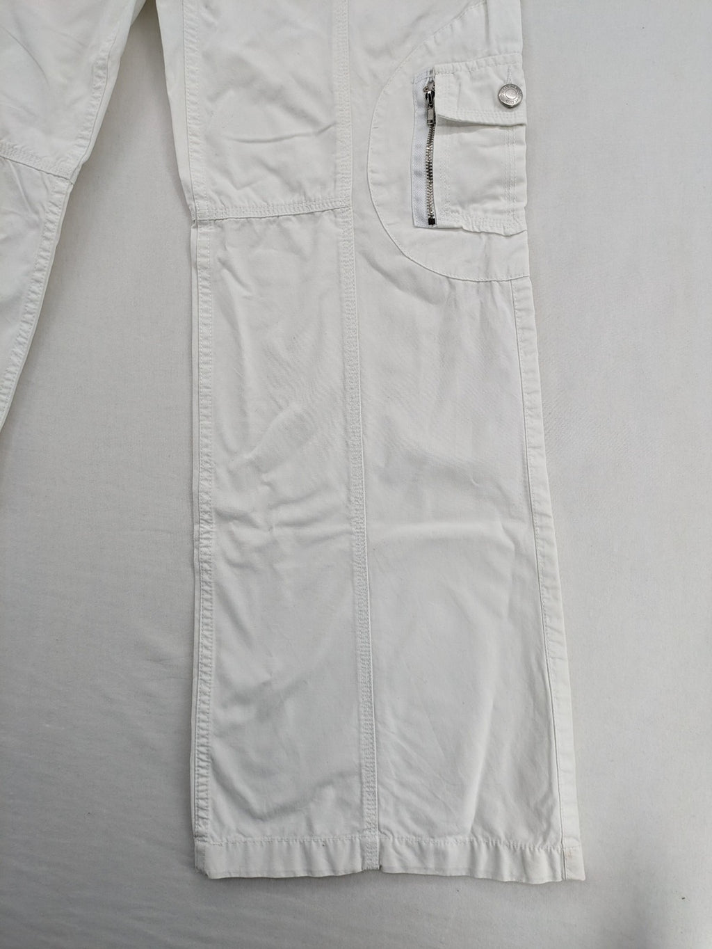 Street One white cargo pants with side pockets and wide leg design.
