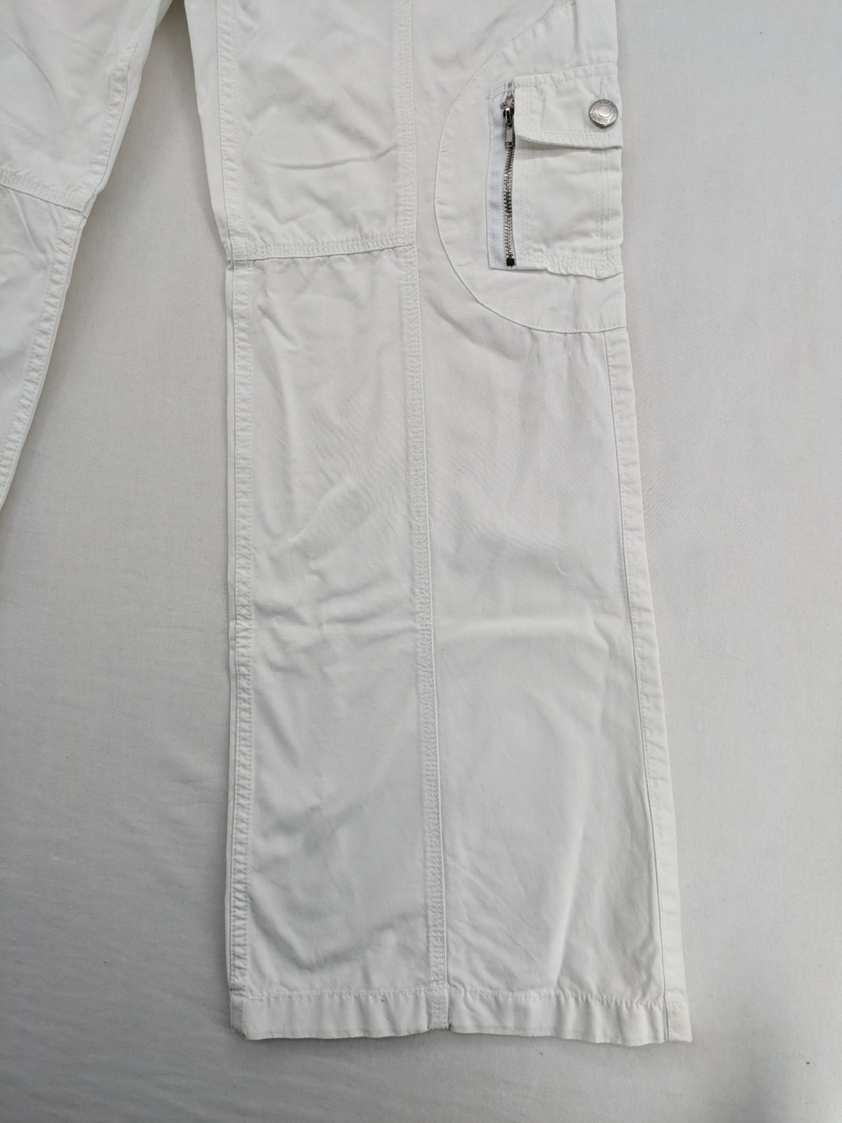 Street One white cargo pants with side pockets and wide leg design.