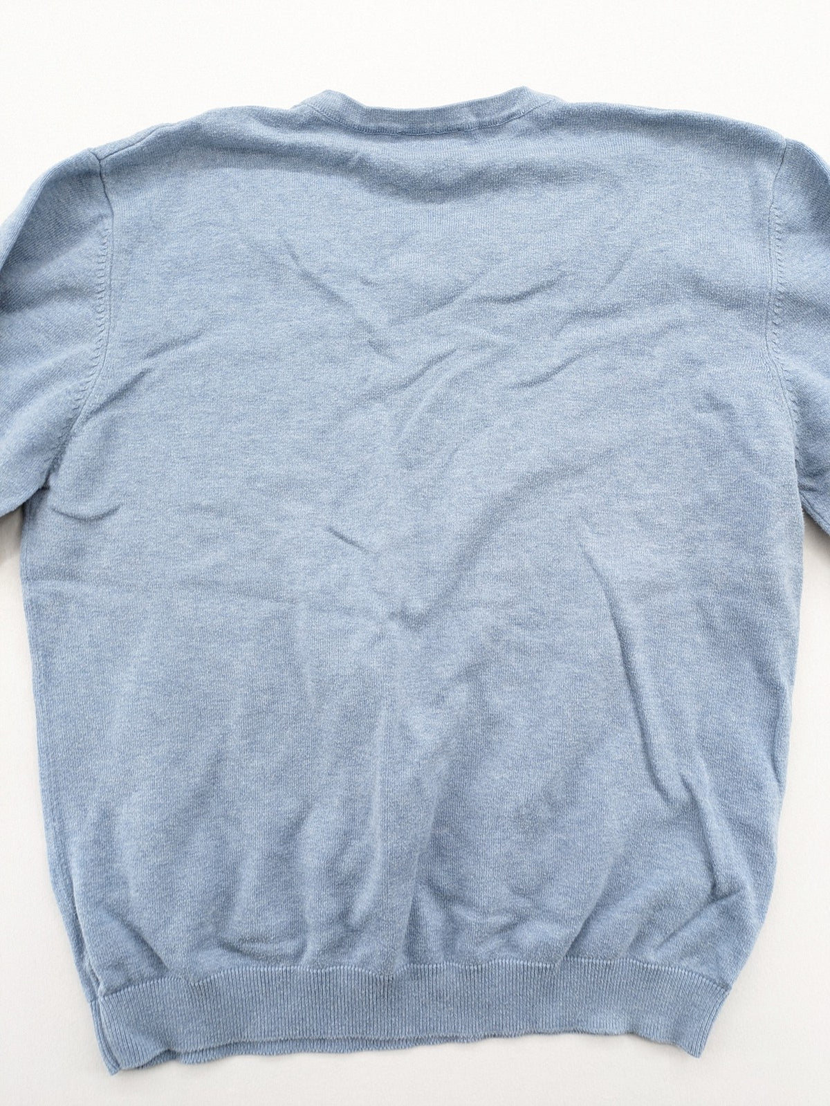 BRAX blue turtle neck jumper with V-neck and subtle "X" logo embroidery.