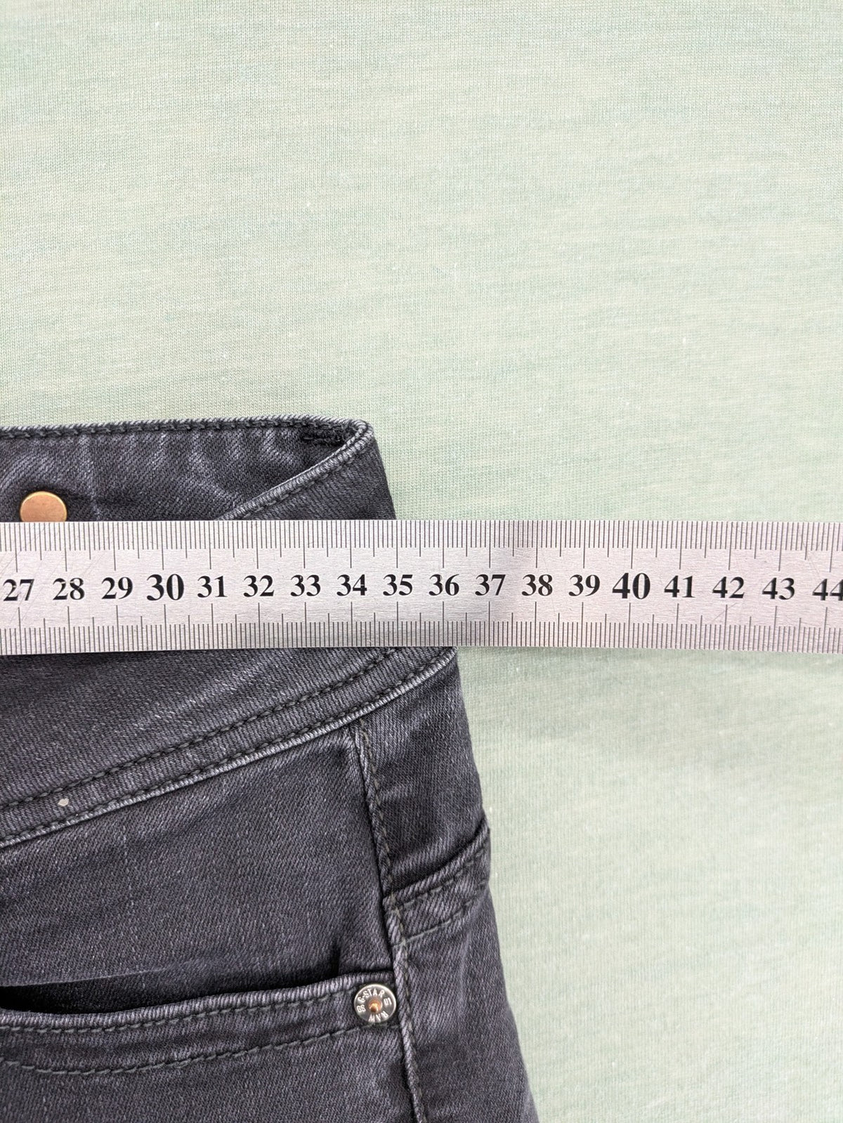 G-Star Raw grey straight jeans with 5-pocket design and logo detailing.