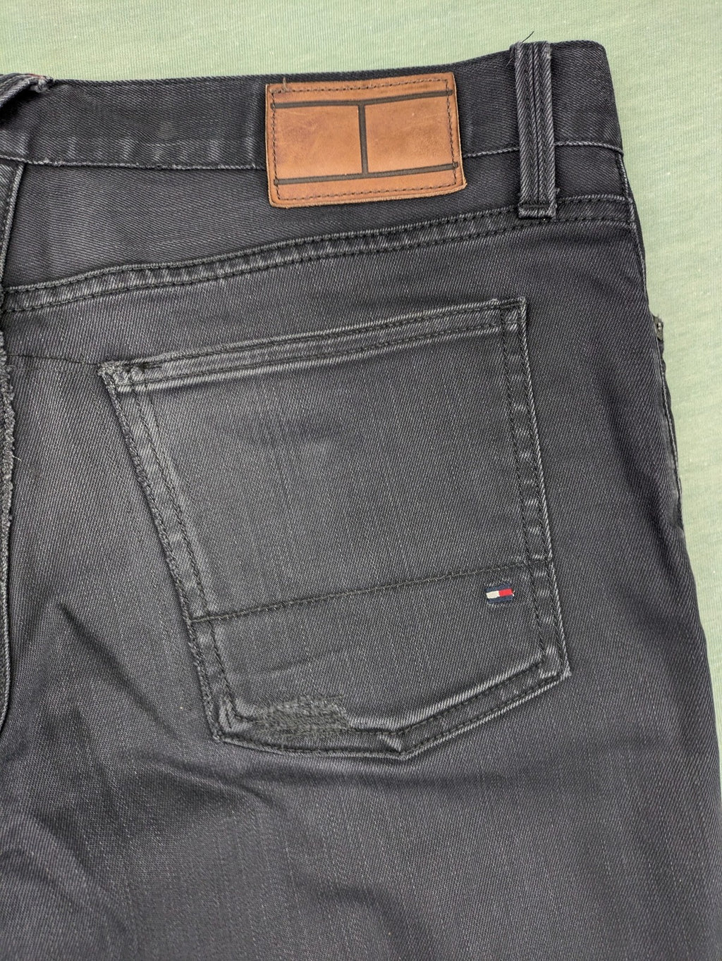 Tommy Hilfiger grey straight jeans faded denim with iconic logo detail.