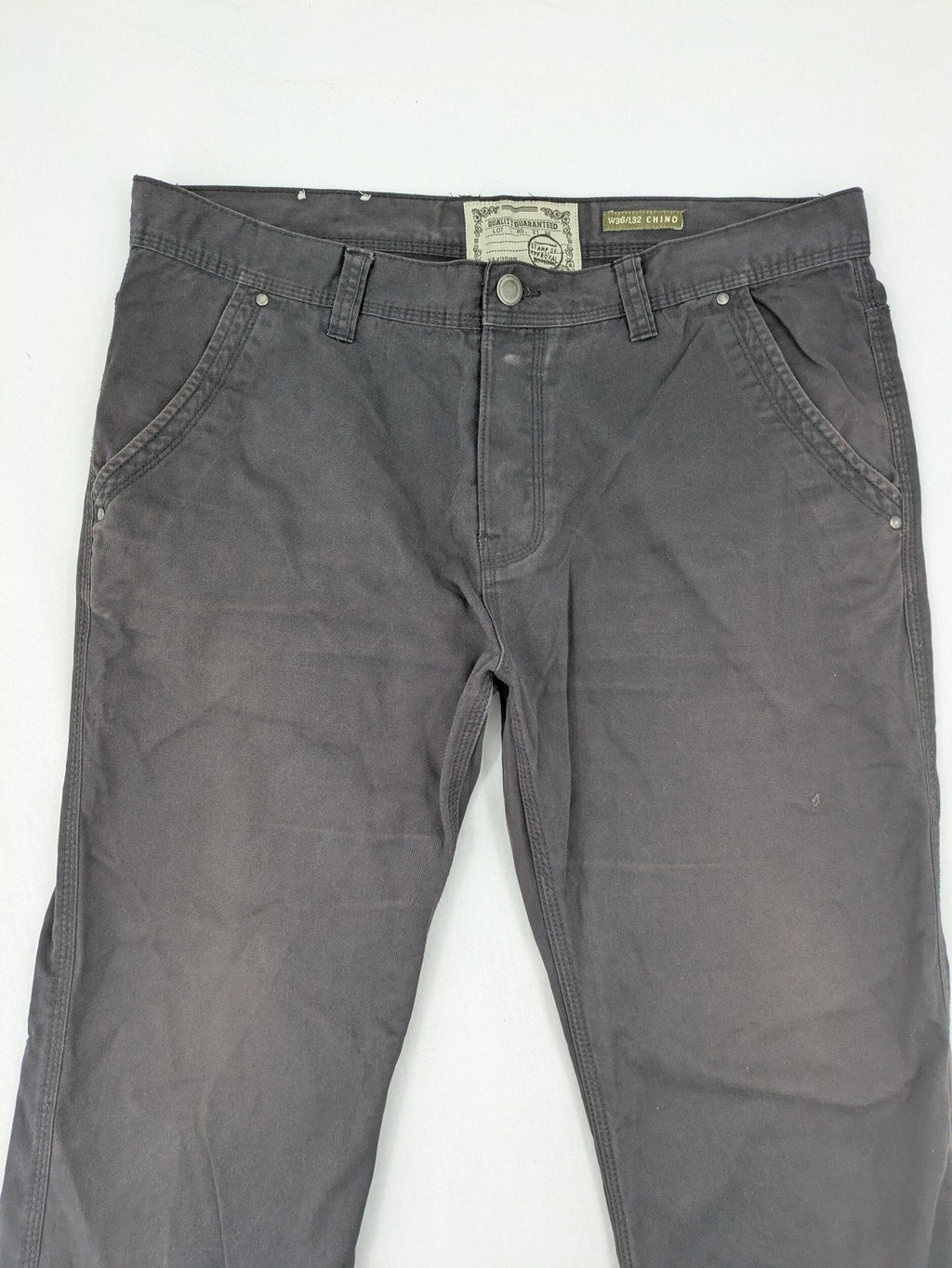 Denim & Co. grey chino pants cotton workwear with button fly and pocket rivets.