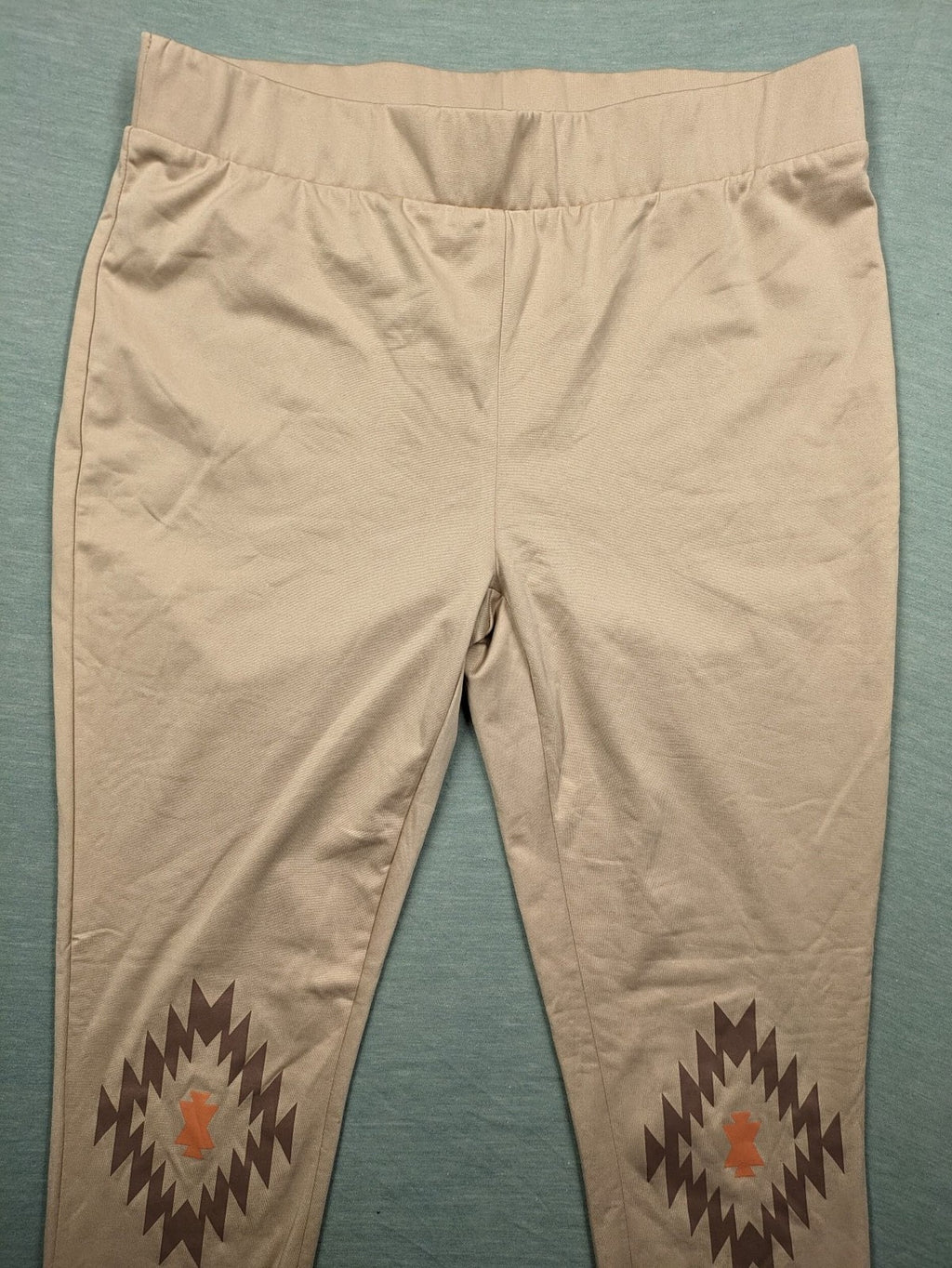 bpc bonprix collection beige leggings with colorful Aztec pattern at knees and hem